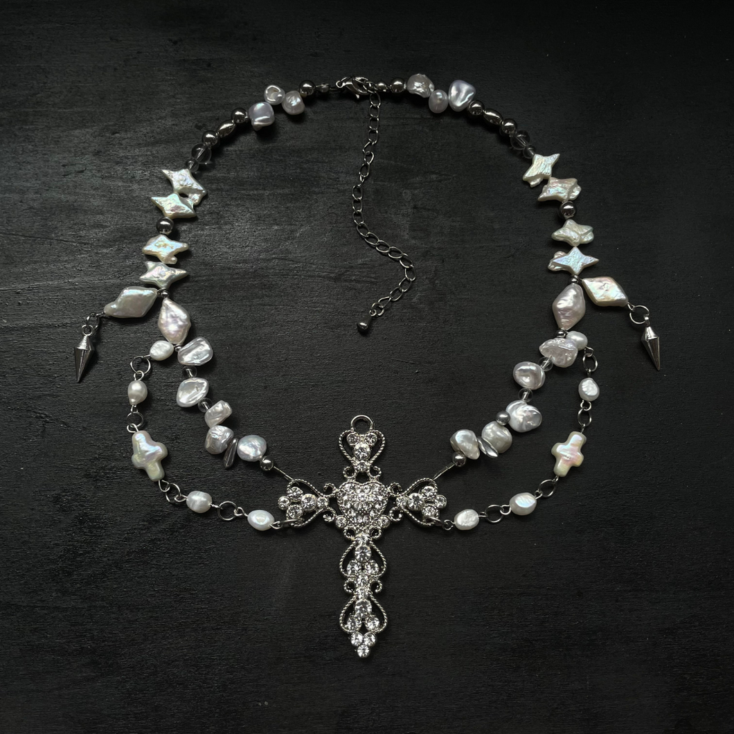 the crucifix necklace